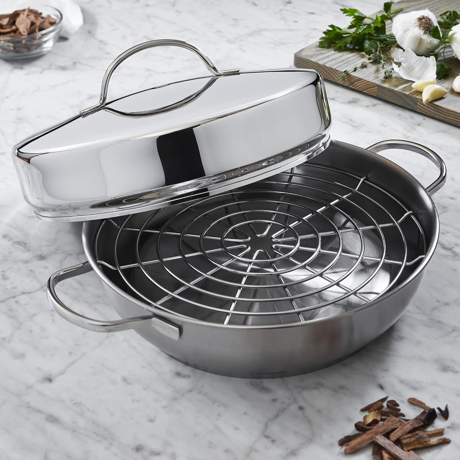 Wok Demeyere Industry 12.6″ de acero inoxidable con tapa de acero y rejilla metálica para vapor/escurrir; construcción 5-ply, asas laterales y base estable, apto para inducción.