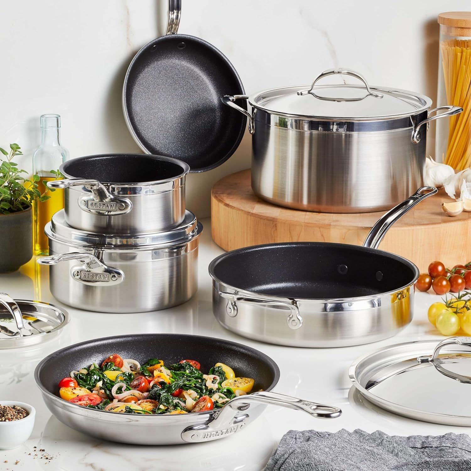 Juego de ollas Hestan de lujo titanio y acero inoxidable