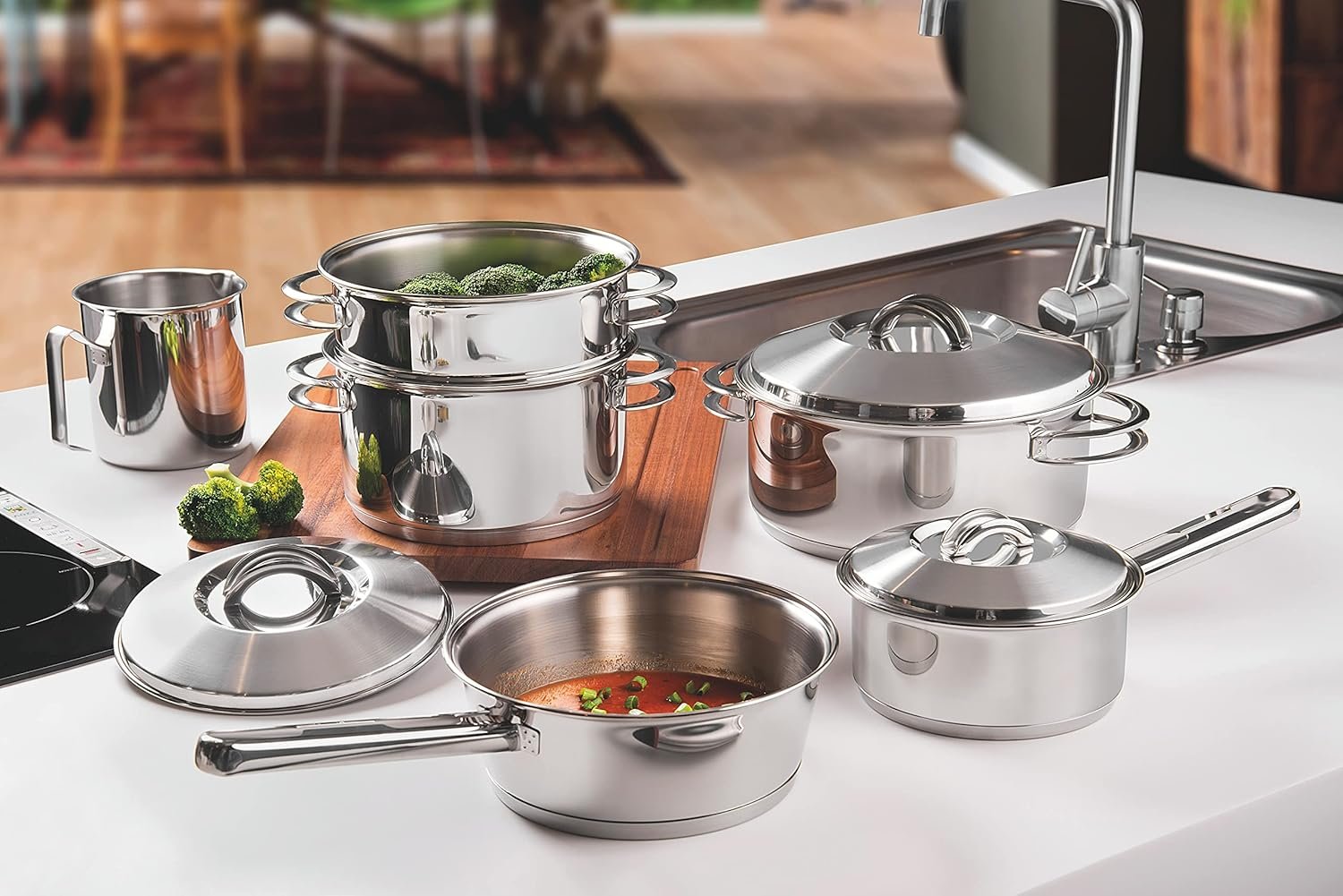 Juego de ollas Tramontina de acero inoxidable con tapas de vidrio, ideal para cocinar con durabilidad y estilo